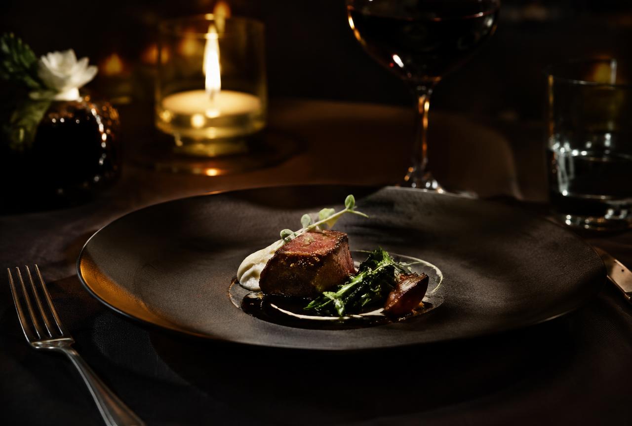 Illustrative michelin star image; not a photograph of a Alain Ducasse product or property.